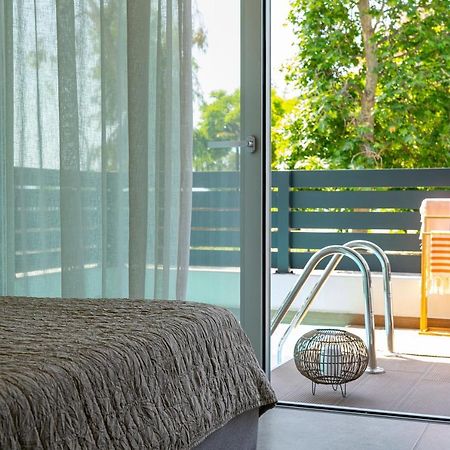 Aelia Seaside Luxury Suites Nea Karvali Esterno foto