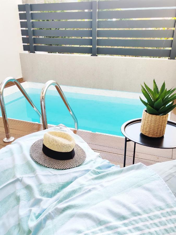 Aelia Seaside Luxury Suites Nea Karvali Esterno foto