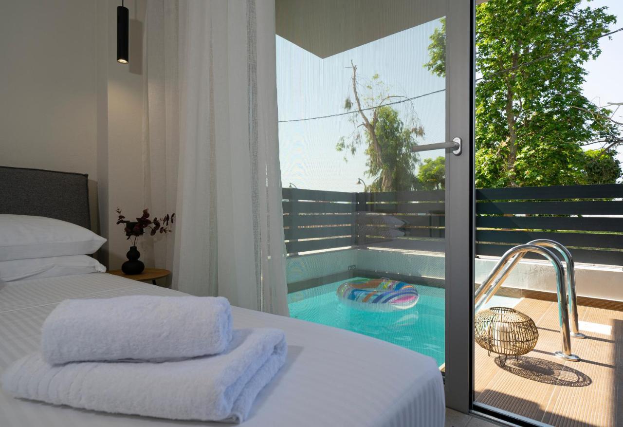 Aelia Seaside Luxury Suites Nea Karvali Esterno foto